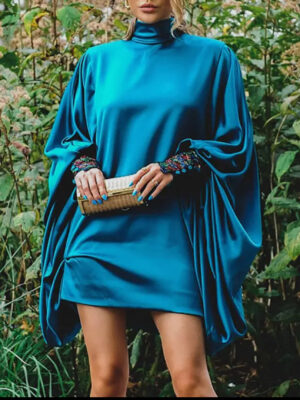 Immerse yourself in the essence of sophistication with this Peacock Blue Dress, where opulence meets timeless design. The rich, jewel-toned hue exudes a sense of luxury, capturing the depth and mystery of the ocean’s most exquisite shade.
